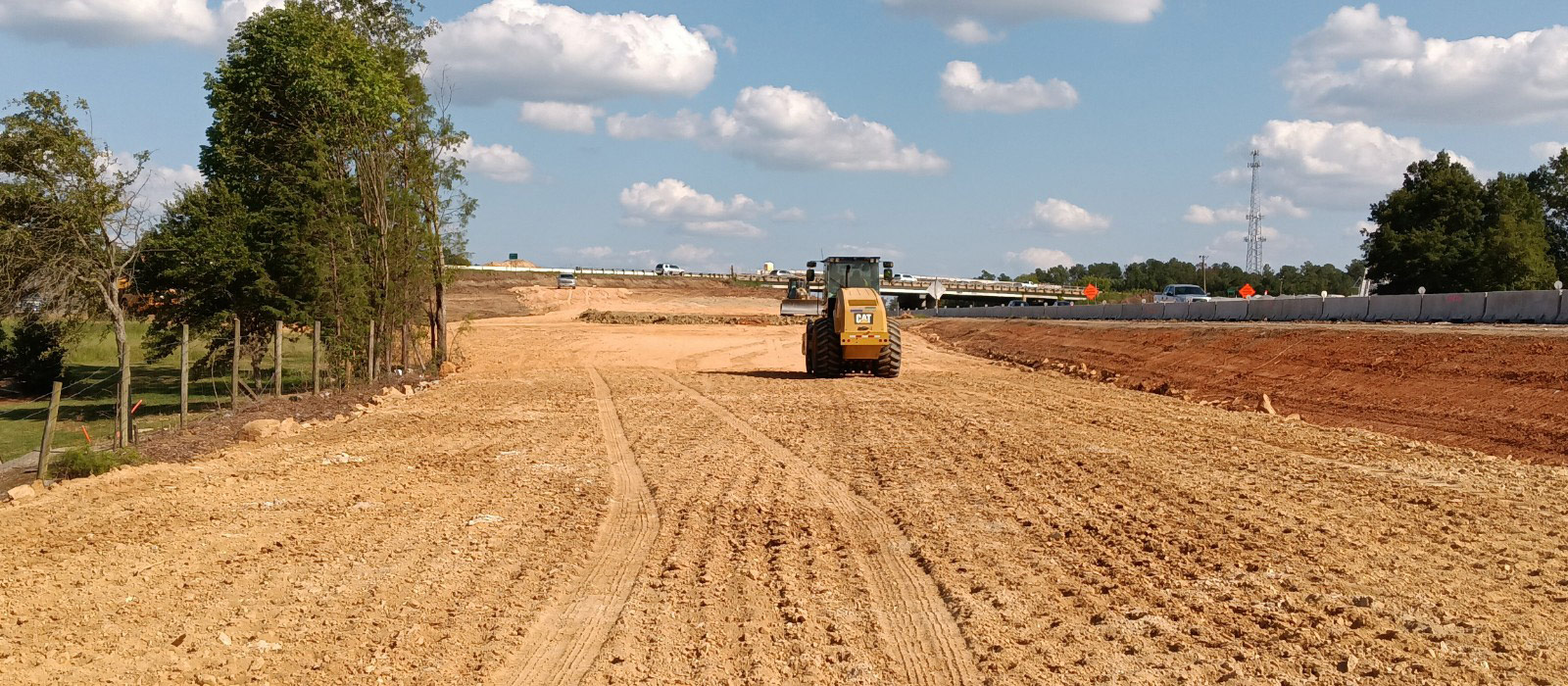 At Exit 97, work has begun on the new westbound on ramp behind the Food Lion shopping center.