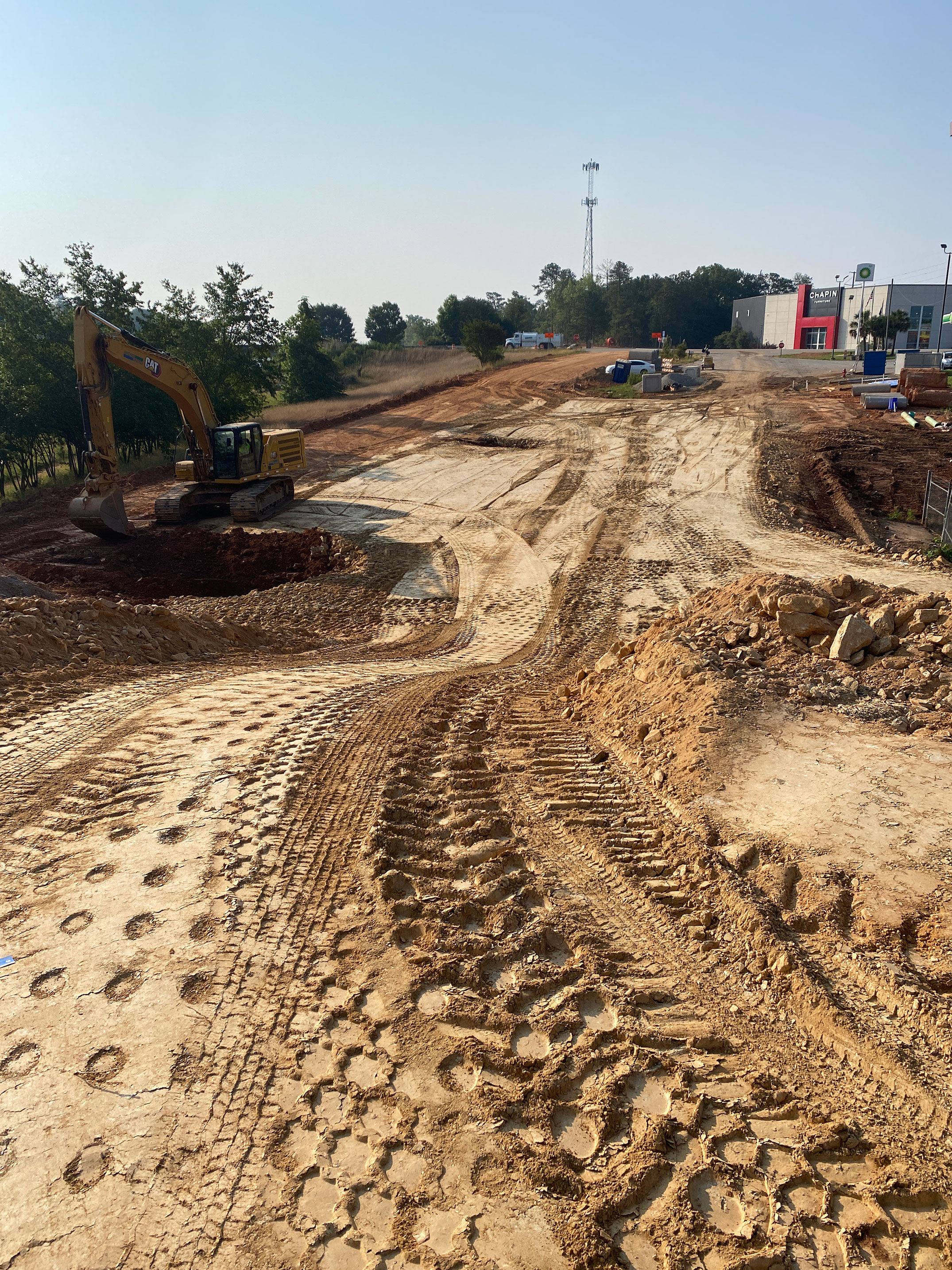 Crews are preparing embankment for the new off ramp at Exit 91 eastbound.  Installation of drain pipes and utility connections are completed as the work progresses.