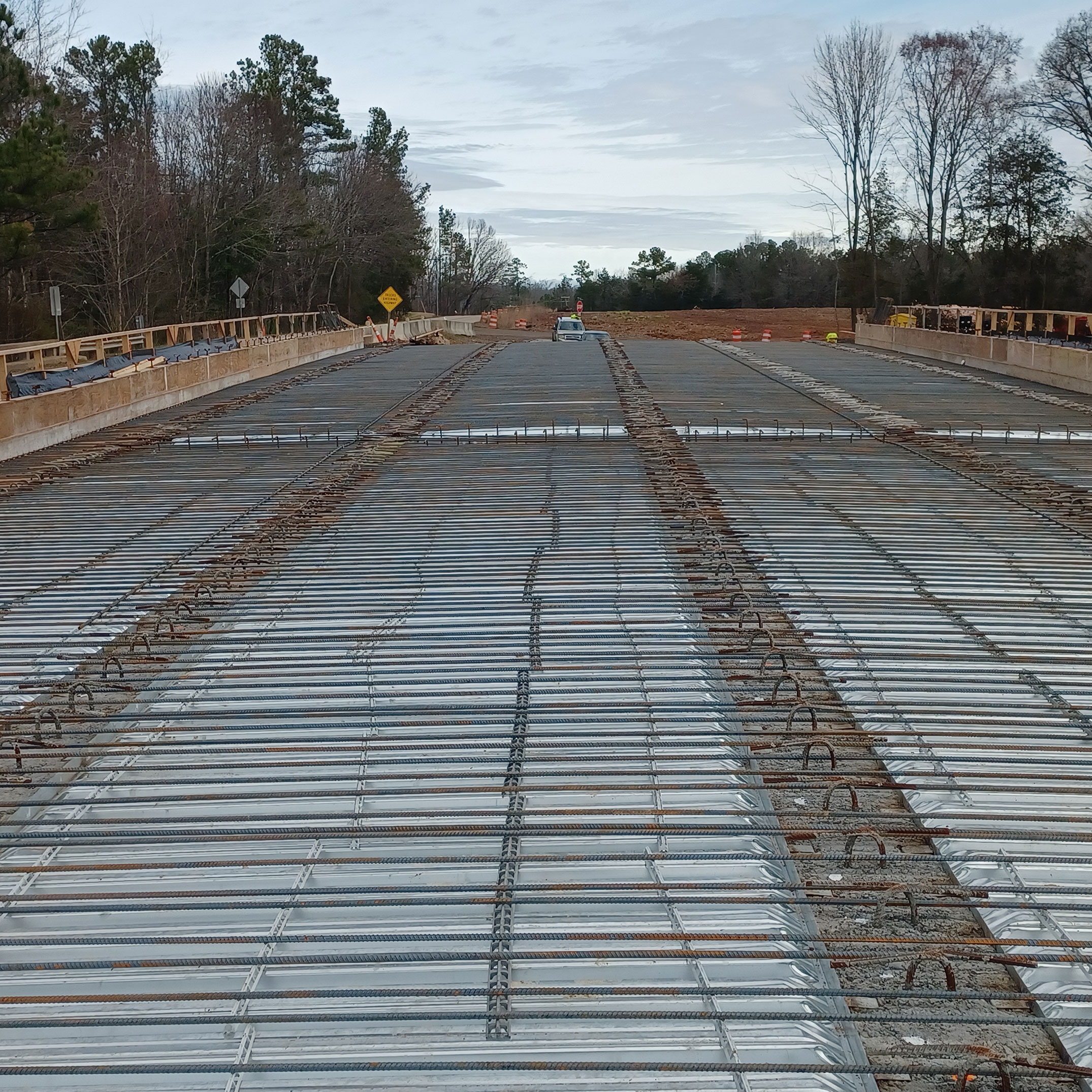 The contractor has started to place the reinforcing steel on the bridge deck of the new bridge on Mount Vernon Church Road over I-26.  Over 69,000 lbs of steel will be placed in this bridge deck before concrete can be placed.