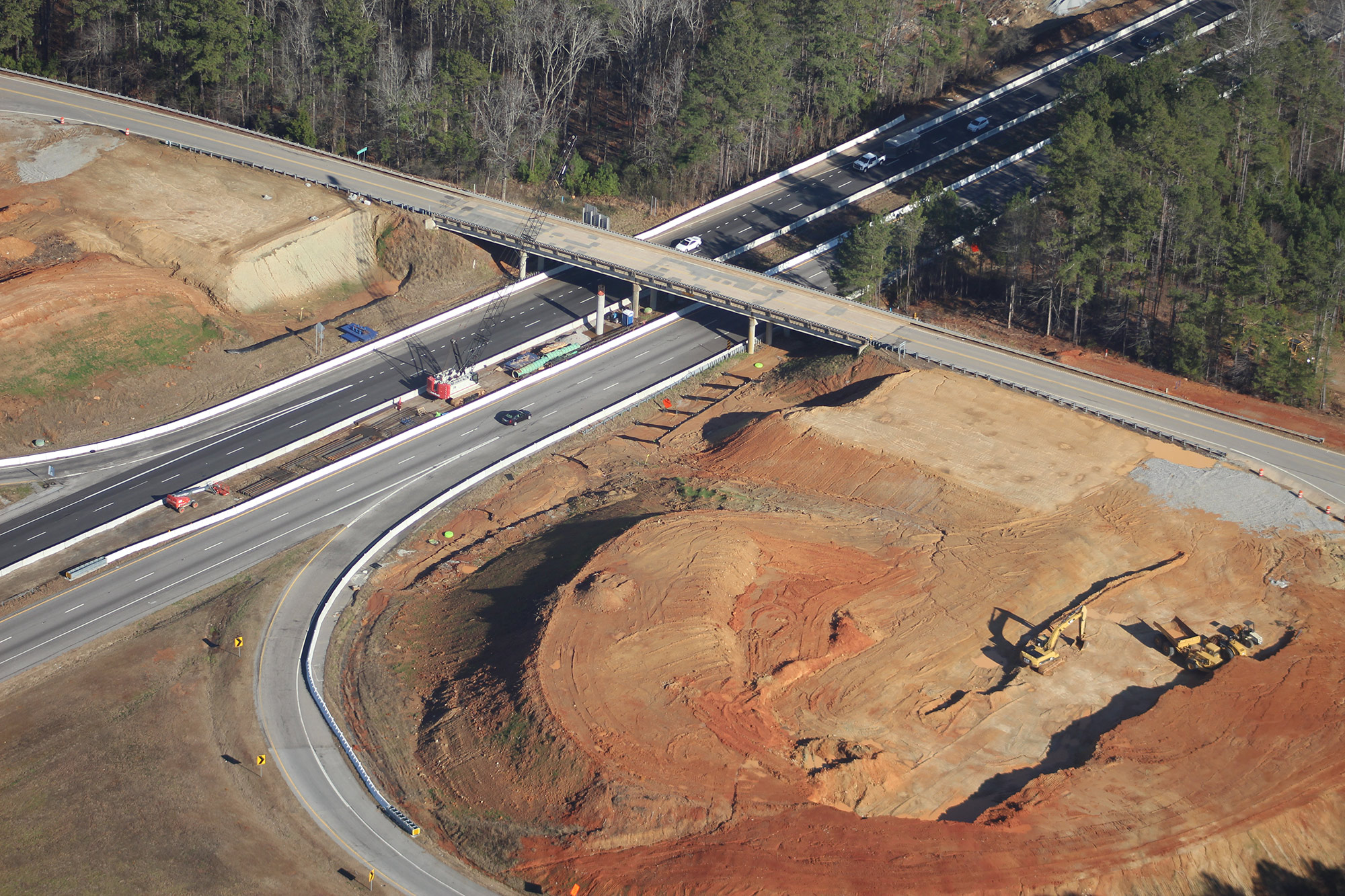 Aerial view of Exit 85 and SC-202.  New earth bridge abutments in foreground